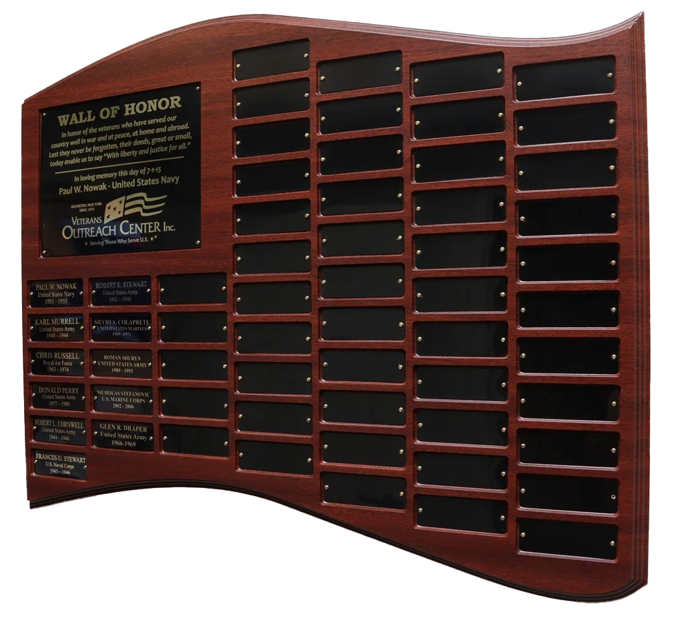 Wall-mounted plaque showing names of veterans who are being recognized on the Wall of Honor.
